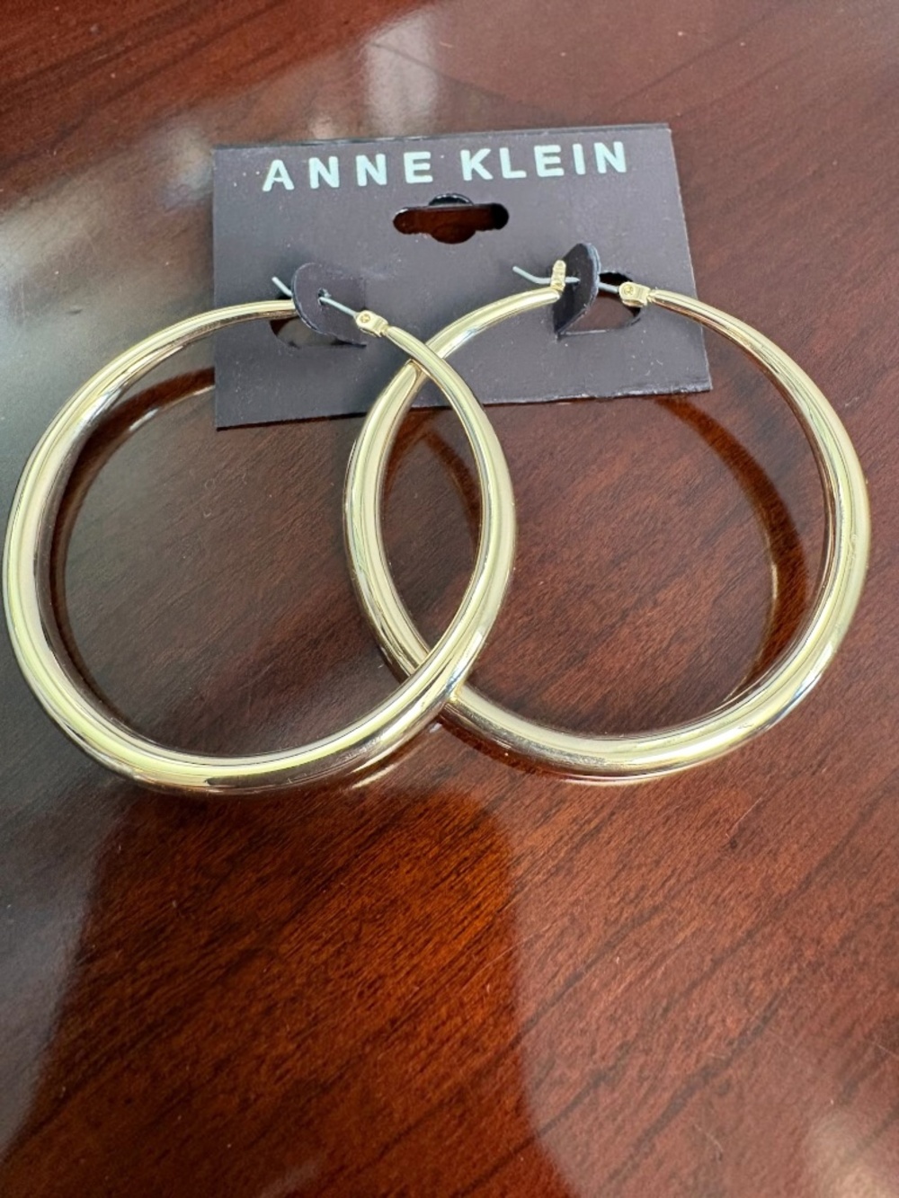 Anne Klein Polished Gold Tone Hoop Earrings